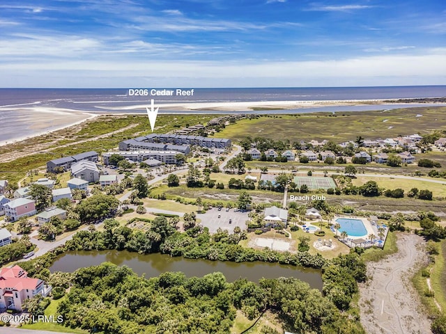 aerial view featuring a water view and a view of the beach