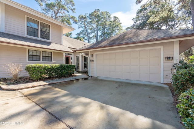 view of front of home with a garage