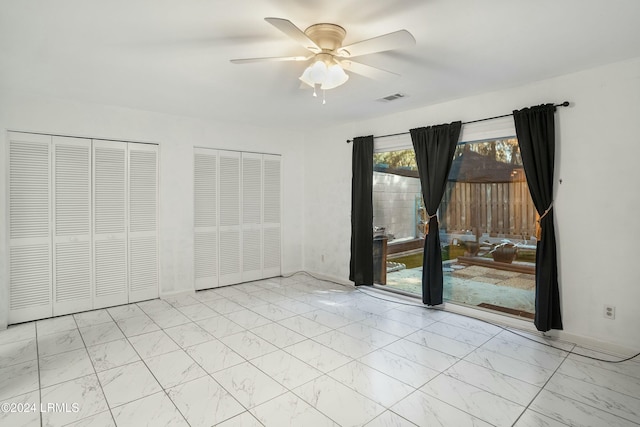 unfurnished room featuring ceiling fan