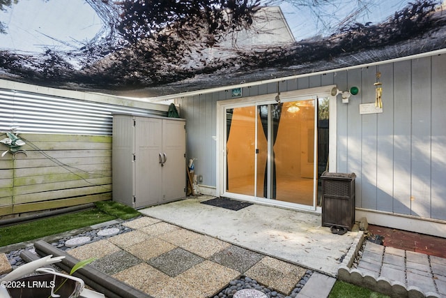 entrance to property with a patio area