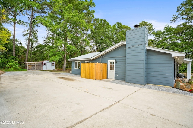46 Mroz Rd, Beaufort, SC 29906 - garage with a storage unit and concrete driveway
