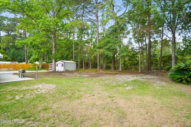 46 Mroz Rd, Beaufort, SC 29906 - view of yard with a shed, an outdoor structure, and a patio