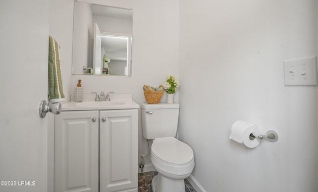 46 Mroz Rd, Beaufort, SC 29906 - half bathroom featuring toilet, baseboards, and vanity