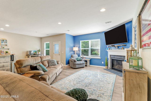 13 Hager Rd, Bluffton, SC 29910 - living room with visible vents, baseboards, recessed lighting, and a fireplace with flush hearth