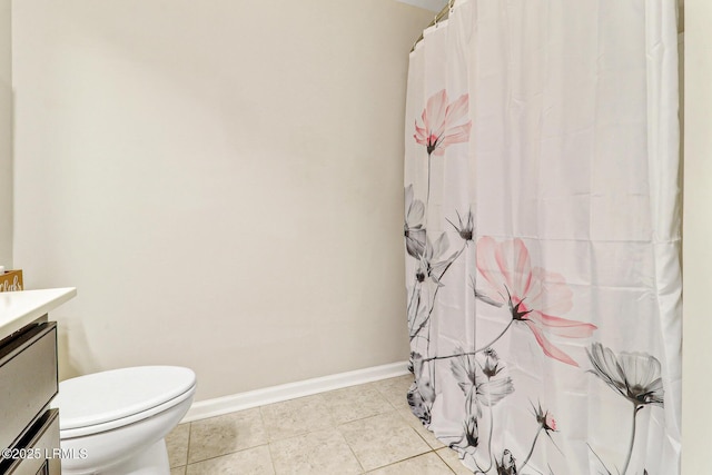 13 Hager Rd, Bluffton, SC 29910 - bathroom with toilet, vanity, baseboards, and tile patterned flooring