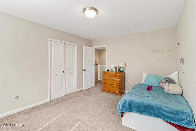 13 Hager Rd, Bluffton, SC 29910 - bedroom featuring a closet, baseboards, and carpet