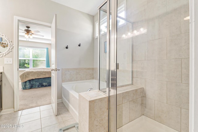 13 Hager Rd, Bluffton, SC 29910 - ensuite bathroom featuring a bath, a ceiling fan, a shower stall, ensuite bath, and tile patterned flooring