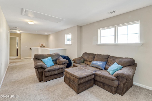 13 Hager Rd, Bluffton, SC 29910 - living area featuring visible vents, baseboards, attic access, and carpet flooring