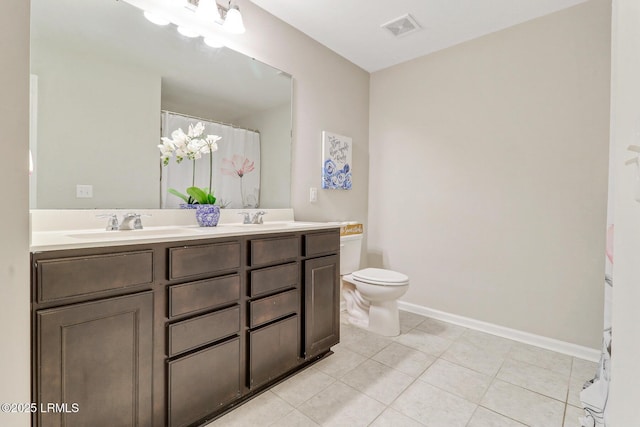 13 Hager Rd, Bluffton, SC 29910 - full bathroom featuring visible vents, baseboards, a sink, toilet, and tile patterned flooring