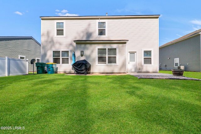 13 Hager Rd, Bluffton, SC 29910 - back of house with a patio area, fence, and a yard