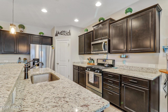 13 Hager Rd, Bluffton, SC 29910 - kitchen featuring light stone countertops, dark brown cabinetry, recessed lighting, appliances with stainless steel finishes, and a sink