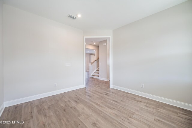 carpeted living room with ceiling fan