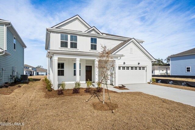 view of front facade with a garage and a lawn