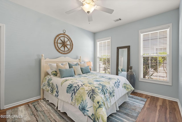 32 Aspen Hall Rd, Bluffton, SC 29910 - bedroom featuring wood finished floors, visible vents, baseboards, and multiple windows