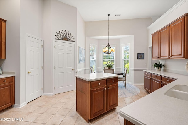 32 Aspen Hall Rd, Bluffton, SC 29910 - kitchen with light tile patterned flooring, an inviting chandelier, light countertops, decorative light fixtures, and visible vents