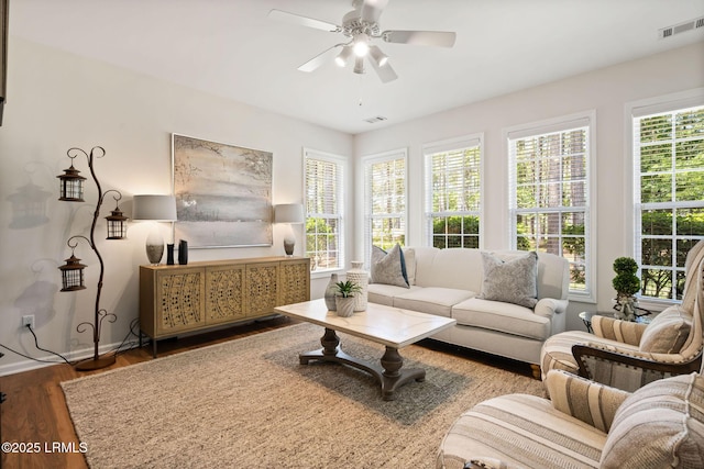 32 Aspen Hall Rd, Bluffton, SC 29910 - living area featuring baseboards, wood finished floors, visible vents, and ceiling fan