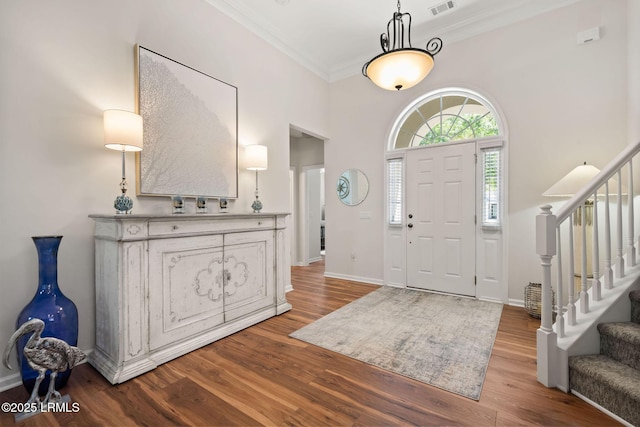 32 Aspen Hall Rd, Bluffton, SC 29910 - foyer with stairway, wood finished floors, visible vents, crown molding, and baseboards