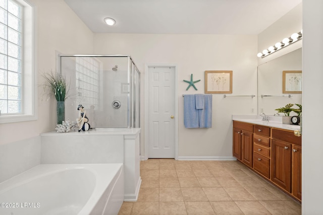 32 Aspen Hall Rd, Bluffton, SC 29910 - bathroom with a shower stall, tile patterned floors, vanity, a bath, and baseboards