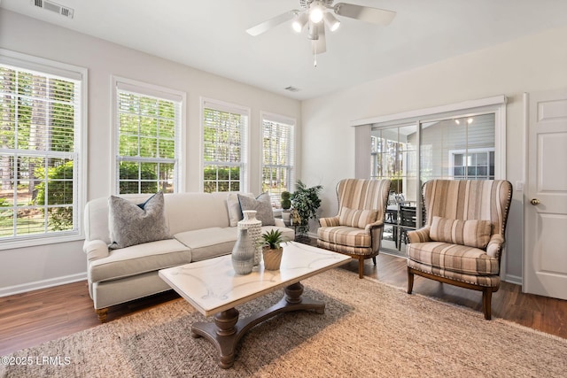 32 Aspen Hall Rd, Bluffton, SC 29910 - living area with baseboards, wood finished floors, visible vents, and ceiling fan