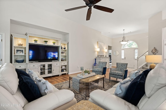 32 Aspen Hall Rd, Bluffton, SC 29910 - living area featuring baseboards, wood finished floors, stairway, ceiling fan, and ornamental molding