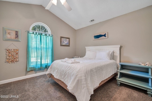 bedroom featuring ceiling fan, visible vents, baseboards, vaulted ceiling, and carpet