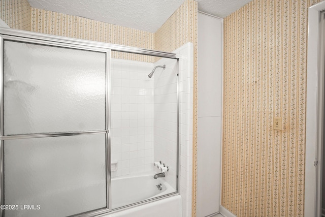 806 Coates Ln, Beaufort, SC 29902 - full bathroom featuring wallpapered walls, a textured ceiling, and enclosed tub / shower combo