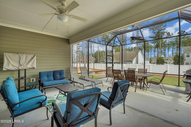 sunroom / solarium with ceiling fan