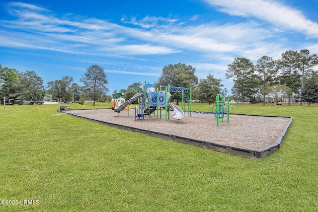 communal playground featuring a lawn