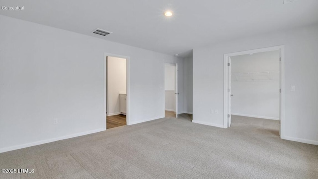 134 Twickenham Loop, Yemassee, SC 29945 - unfurnished bedroom with carpet floors, a spacious closet, a closet, ensuite bathroom, and recessed lighting