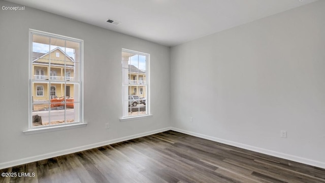 134 Twickenham Loop, Yemassee, SC 29945 - unfurnished room with dark wood-type flooring and healthy amount of natural light
