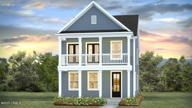134 Twickenham Loop, Yemassee, SC 29945 - view of front of house featuring a balcony, a front yard, and a porch