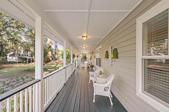 wooden deck featuring covered porch