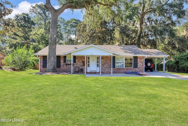 single story home with a carport, covered porch, and a front lawn