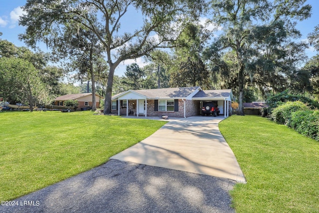 single story home featuring a front lawn