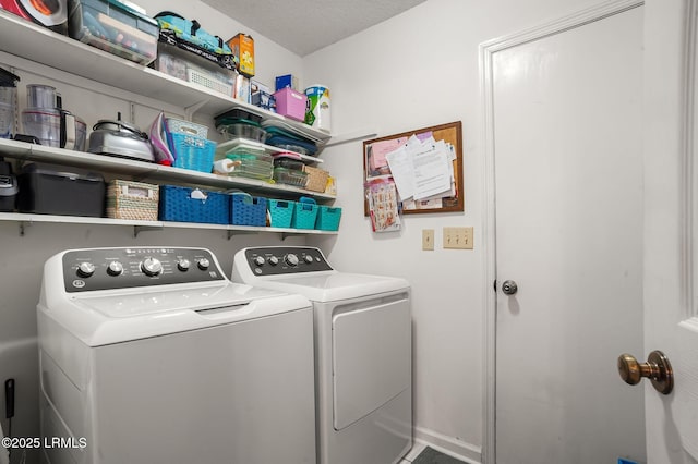 1101 Beavers Den, Beaufort, SC 29902 - laundry room featuring washing machine and clothes dryer, laundry area, and a textured ceiling