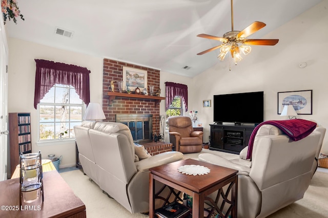 1101 Beavers Den, Beaufort, SC 29902 - living area with a ceiling fan, a brick fireplace, vaulted ceiling, and visible vents