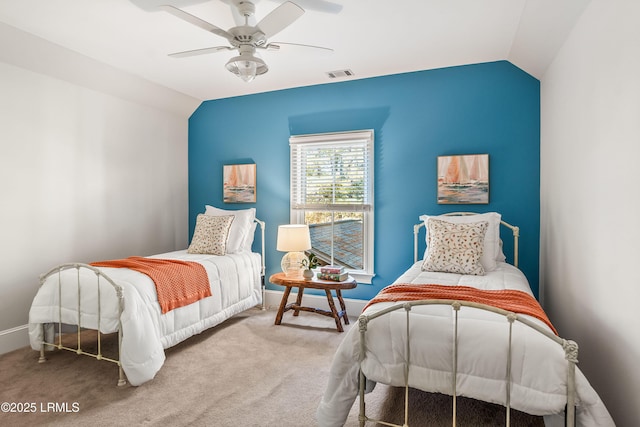 carpeted bedroom with ceiling fan and lofted ceiling