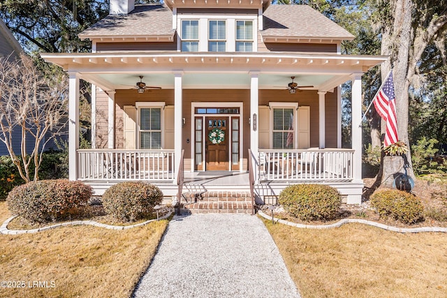 view of front of property featuring ceiling fan and covered porch