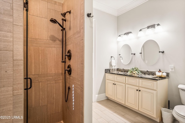 bathroom featuring crown molding, walk in shower, vanity, and toilet