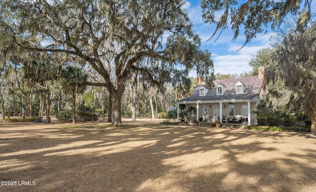 view of yard with a porch