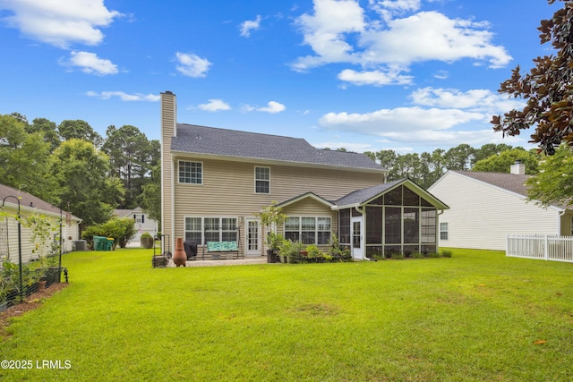 69 Wheatfield Cir, Bluffton, SC 29910 - back of property with a sunroom, a chimney, and a patio area