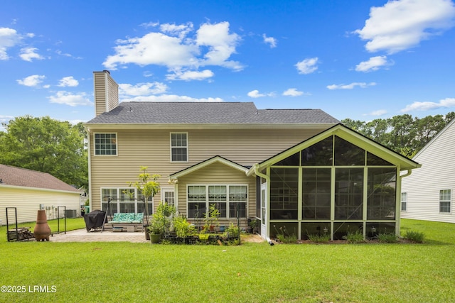 69 Wheatfield Cir, Bluffton, SC 29910 - back of house with a sunroom, a patio area, and a yard