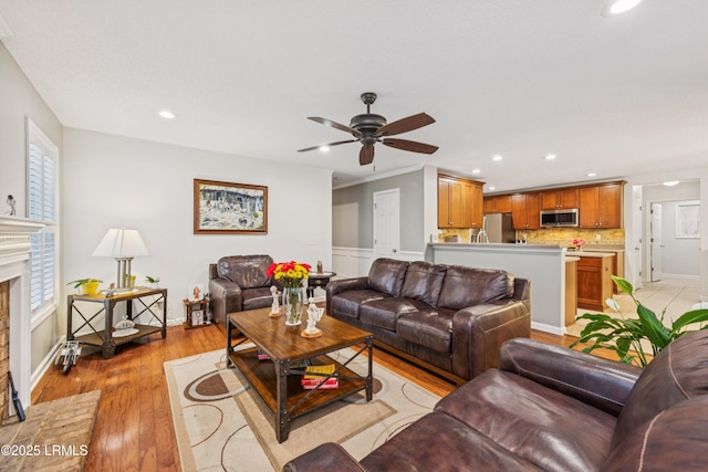 69 Wheatfield Cir, Bluffton, SC 29910 - living area featuring recessed lighting, ceiling fan, a fireplace, and light wood-style floors