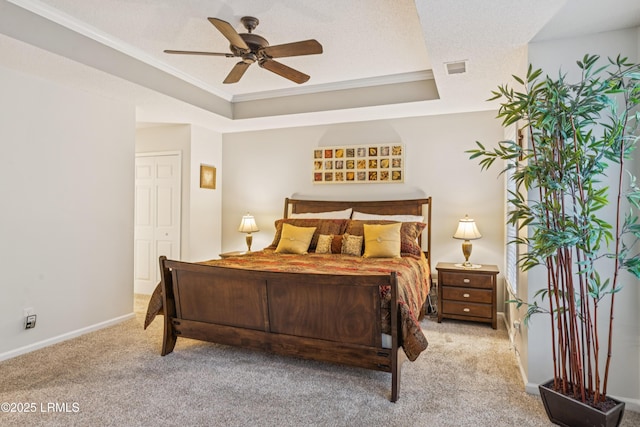 69 Wheatfield Cir, Bluffton, SC 29910 - carpeted bedroom with crown molding, a tray ceiling, ceiling fan, and a closet