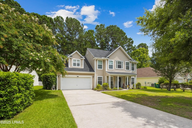 69 Wheatfield Cir, Bluffton, SC 29910 - traditional home with concrete driveway, a front lawn, covered porch, and an attached garage