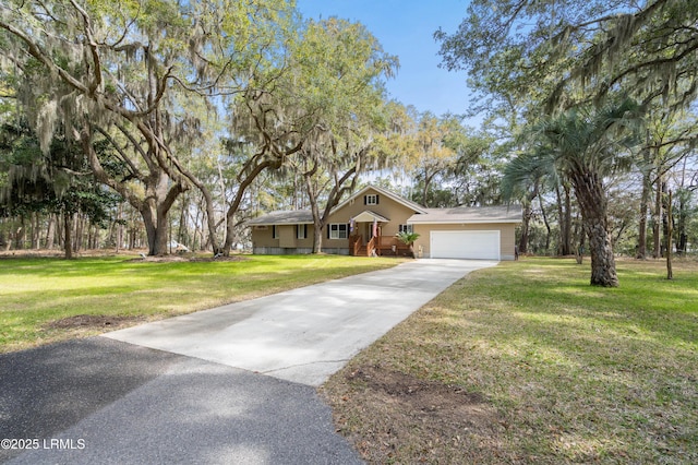 ranch-style home with a garage, driveway, and a front lawn