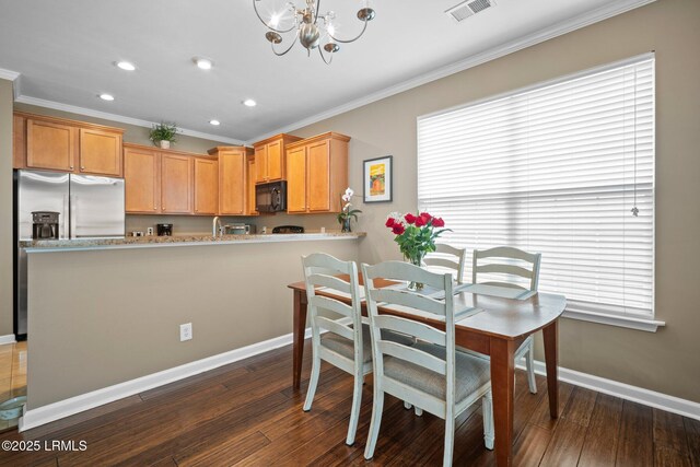 191 Heritage Pkwy, Bluffton, SC 29910 - dining room with ornamental molding, a chandelier, dark wood-style flooring, baseboards, and recessed lighting