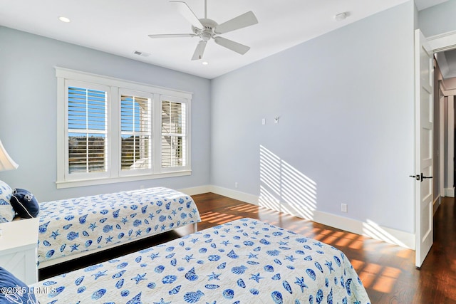 bedroom featuring visible vents, recessed lighting, baseboards, and wood finished floors