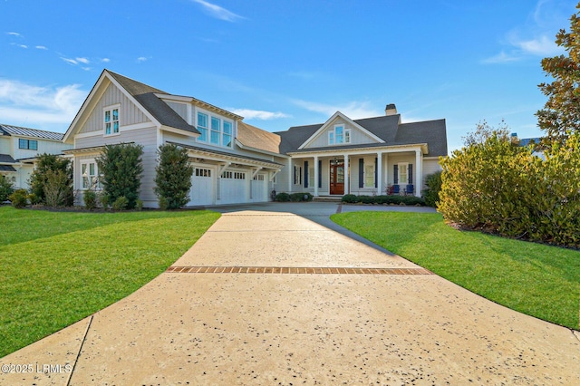 view of front of property with a front lawn, board and batten siding, covered porch, concrete driveway, and an attached garage