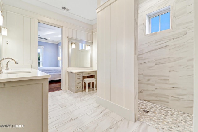 ensuite bathroom featuring visible vents, crown molding, walk in shower, ensuite bathroom, and vanity